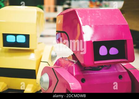 Close-up of two robotic assistant. Modern technologies in everyday life or the concept of the future. Stock Photo
