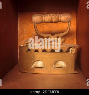 An old iron used in ironing clothes in the 80's. Stock Photo