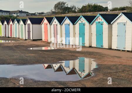 Beach hut reflections at Goodrington on the south Devon coast. Stock Photo