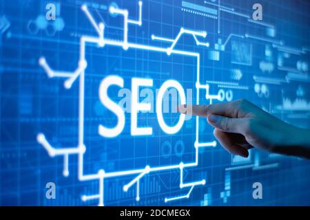 Concept SEO search engine optimization of on a futuristic digital display. Stock Photo