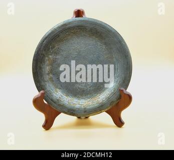 Egyptian silver plate dated 40's isolated on neutral background Stock Photo