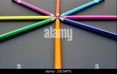 Many coloured pencils close up, metaphor of strategy and teamwork Stock Photo