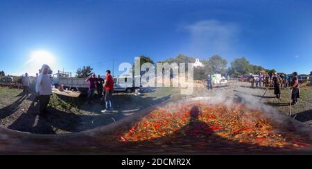 360 degree panoramic view of Giant Paella is prepared during the Fiesta de Santa Barbara next to the small chapel of Sta Barbara near the small village of Altea La Vella, Alicante