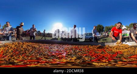 360 degree panoramic view of Giant Paella is prepared during the Fiesta de Santa Barbara next to the small chapel of Sta Barbara near the small village of Altea La Vella, Alicante