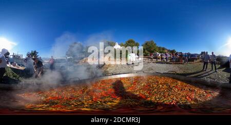 360 degree panoramic view of Giant Paella is prepared during the Fiesta de Santa Barbara next to the small chapel of Sta Barbara near the small village of Altea La Vella, Alicante