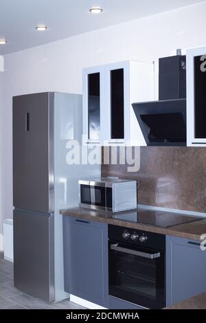 furniture and household appliances in the kitchen, home design and interior. Stock Photo