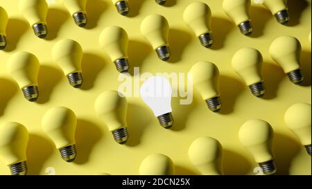 3D rendering. a burning light bulb against the yellow background of switched-off lamps. Stock Photo