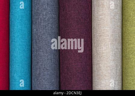 Closeup detail of multi color fabric texture samples. Material color fabric I am in spools of different colors. Stock Photo