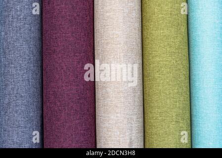 Closeup detail of multi color fabric texture samples. Material color fabric I am in spools of different colors. Stock Photo
