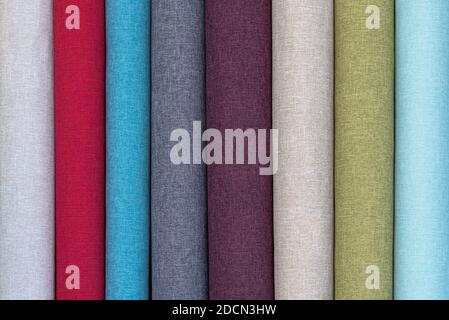Closeup detail of multi color fabric texture samples. Material color fabric I am in spools of different colors. Stock Photo