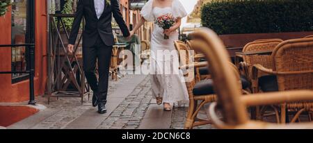 Wedding couple together celebrating happy day in Copenhagen. Marriage agency concept. Stock Photo