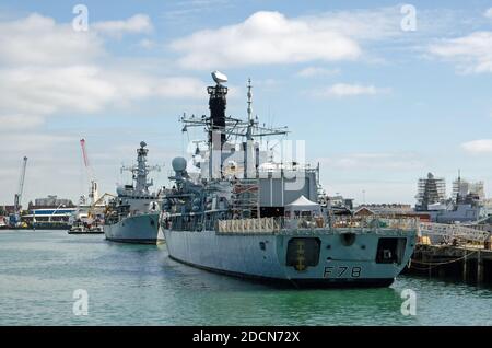 Portsmouth, UK - September 8, 2020: The Royal Navy frigates HMS Kent and HMS Westminster moored prow to prow in Portsmouth Harbour, Hampshire. Stock Photo