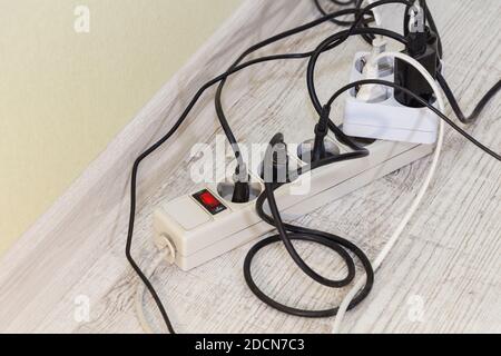 Lots of electrical outlets-enabled devices. Power saving. Stock Photo