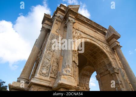 The Arch of Septimius Severus in the archaeological site of Leptis Magna, Libya Stock Photo