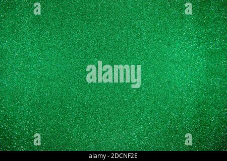 Glitter green background. Photo of monotone shiny background. Stock Photo