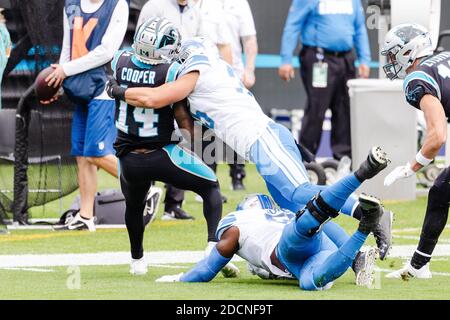 Charlotte, NC, USA. 22nd Nov, 2020. Carolina Panthers wide receiver Pharoh Cooper (14) gets tackled by Detroit Lions safety Miles Killebrew (35) in the NFL matchup at Bank of America Stadium in Charlotte, NC. (Scott Kinser/Cal Sport Media). Credit: csm/Alamy Live News Stock Photo