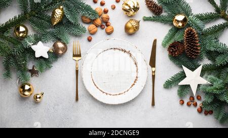 Christmas Banner Dinner Table Setting Frame With Empty Plate, Cutlery, Christmas Toys And Fir Tree. Winter Holidays Background Stock Photo