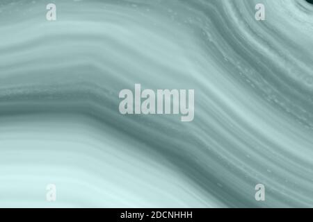 Abstract background, green toned agate mineral cross section, color of the year 2021: Tidewater green Stock Photo