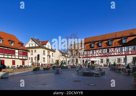 Lorsch, Germany - October 2020: Historic city center of Lorsch with traditional half timbered buildings on sunny day