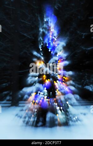 Defocused view of christmas tree Stock Photo