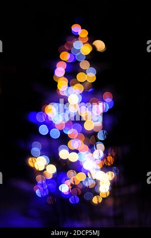 Defocused view of christmas tree Stock Photo