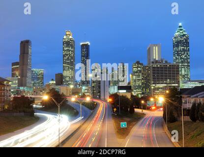 View To Atlanta Skyline From Freedom Parkway At Dusk On A Sunny Autumn Day With A Clear Blue Sky And A Few Clouds Stock Photo