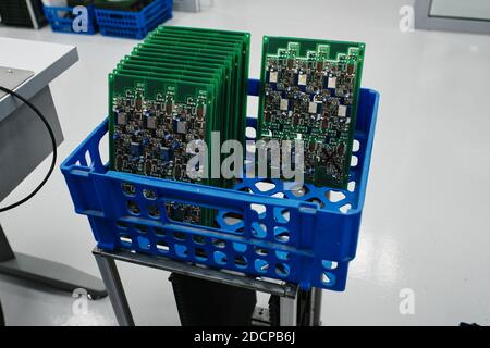 freshly made computer boards in a plastic box Stock Photo