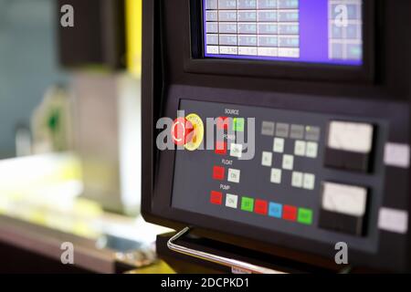 Control panel of CNC waterjet cutting machine. Selective focus. Stock Photo