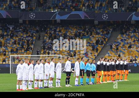 KYIV, UKRAINE - OCTOBER 20, 2020: Dynamo Kyiv and Juventus players lined up on the pitch before their UEFA Champions League game at NSC Olimpiyskyi stadium in Kyiv, Ukraine Stock Photo