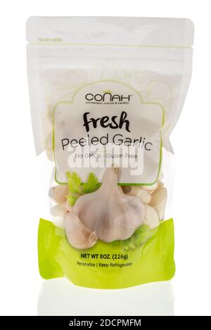 Winneconne, WI -10 November 2020:  A package of Conah fresh peeled garlic on an isolated background. Stock Photo