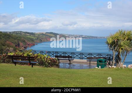 Babbacombe Bay seen from the cliff top looking along the coast towards Dawlish, Exmouth and the River Exe. Along with Torquay a favourite tourist spot Stock Photo