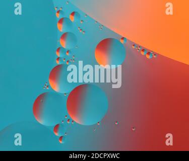 Bubbles of Oil Float on water and make a magical colorful abstract Stock Photo