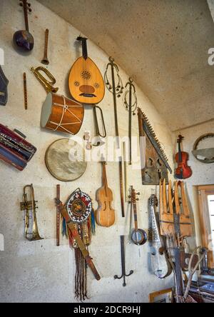 Antique music instruments on the wall Stock Photo