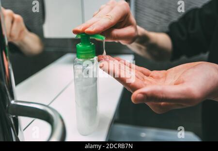 close up. young man washes his hands. Stock Photo