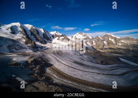 The summits of Piz Palü, Bella Vista, Piz Bernina, Piz Morteratsch and the upper parts of Pers Glacier and Morteratsch Glacier, seen from the summit o Stock Photo