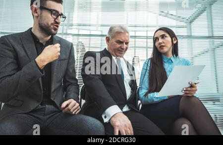 close up. employees discussing a business document Stock Photo