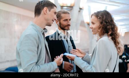 young business people discussing ideas at subway station . Stock Photo