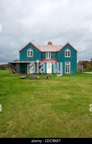 Tower House built c1893 shooting lodge corrugated iron building, Bawdsey, Suffolk, England, UK Stock Photo