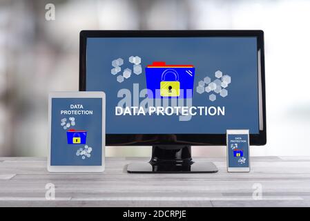 Data protection concept shown on different information technology devices Stock Photo