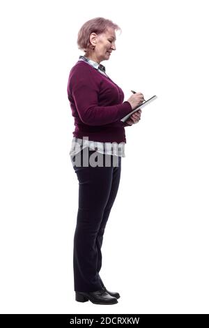 attentive adult woman signing a document. isolated on a white Stock Photo