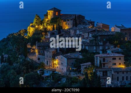 Beautiful view of the town of Deia, located in the Sierra de Tramuntana, a world heritage site, in Mallorca, Spain. Stock Photo