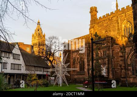 The 'CheSTAR' in front of Chester Cathedral and town hall as part of the city's Christmas celebrations Stock Photo