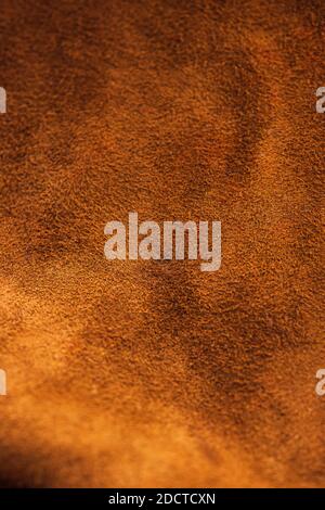 Leather. Brown suede. Brown suede suede as a texture for designers Stock Photo