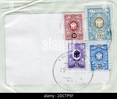 GOMEL, BELARUS, 5 JANUARY 2020, Stamp printed in Russia shows image of the Coat Of Arms, circa 2020. Stock Photo