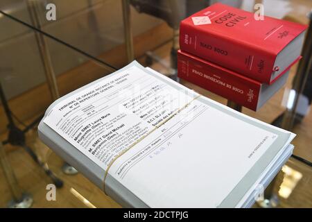 French civil code book with papers related to the trial between Johnny Hallyday's children, Laura Smet and David Hallyday against the singer's widow, at the Nanterre Regional courthouse in Nanterre, near Paris, on March 30, 2018. The Nanterre court was to consider an interim injunction filed by Johnny Hallyday's children over a posthumous album on March 30. Photo by Eliot Blondet/ABACAPRESS.COM Stock Photo