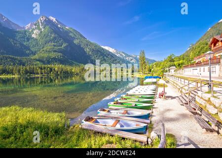 Colorful boats on Hintersee lake in Berchtesgaden Alpine landscape view, Bavaria region of Germany