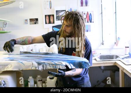 Custom surfboard builder in his workshop ,Newquay , Cornwall, England Stock Photo