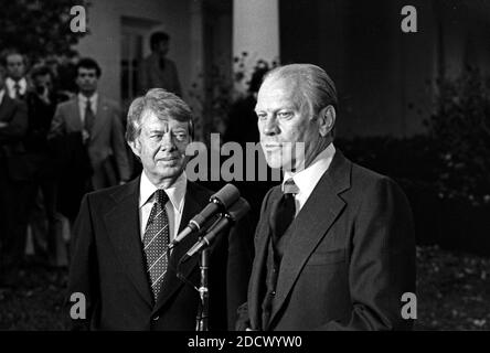 United States President Gerald R. Ford, right, and US President-elect Jimmy Carter, left, meet reporters outside the Oval Office of the White House in Washington, D.C. following their discussions on the transition on November 22, 1976. This is the first meeting between the two men since the Presidential debates during the campaign. Photo by Benjamin E. 'Gene' Forte / CNP/ABACAPRESS.COM Stock Photo