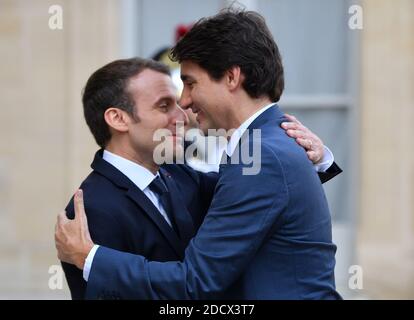 French President Emmanuel Macron greets Canada's President Justin Trudeau in Palais de l'Elysee, Paris, France on April 16th, 2018. Photo by Christian Liewig/ABACAPRESS.COM Stock Photo