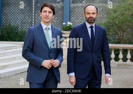 Canadian Prime Minister Justin Trudeau and French Prime Minister Edouard Philippe walk at the Hotel de Matignon, prior to a meeting on April 17, 2018 in Paris, France. Photo by Leon Tanguy/Pool/ABACAPRESS.COM Stock Photo